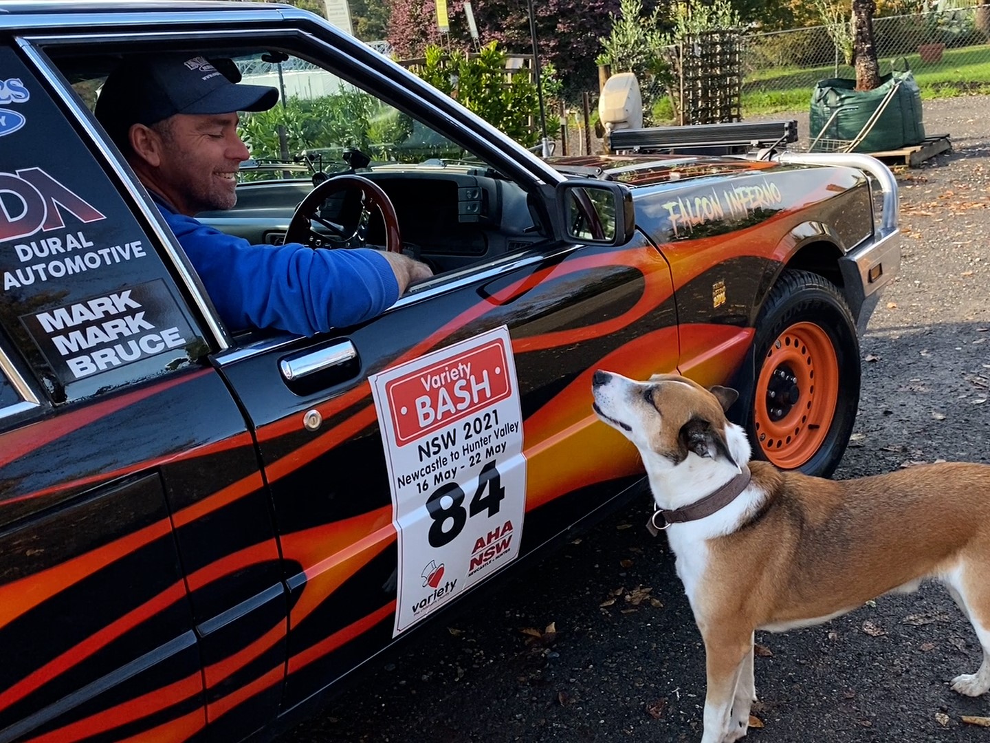 Mark Engall farewells his dog Reggie before taking part in the 2021 Variety Bash